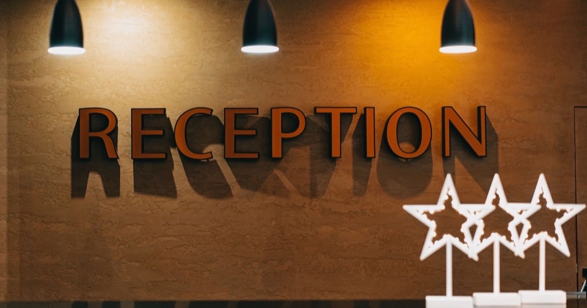 Hotel management software at a front desk