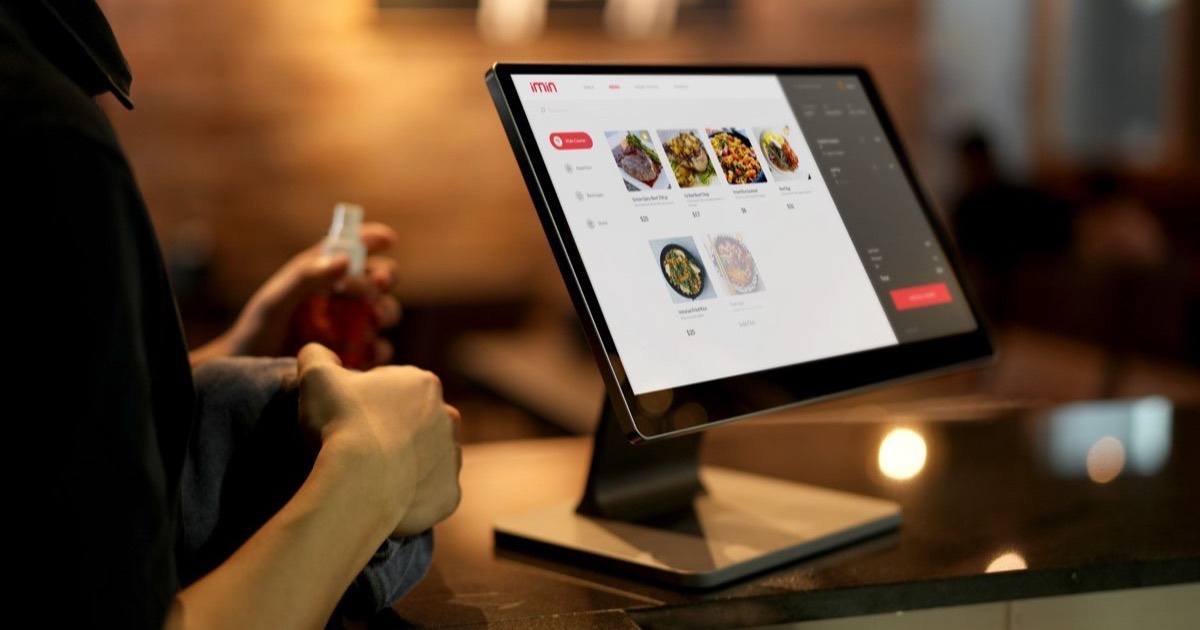 Restaurant POS and billing software on a counter screen