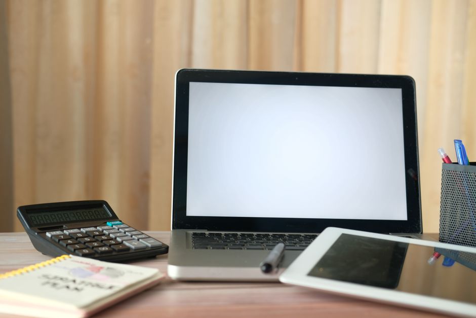 Accounting ledger and a business dashboard side by side representing Tally versus a custom ERP